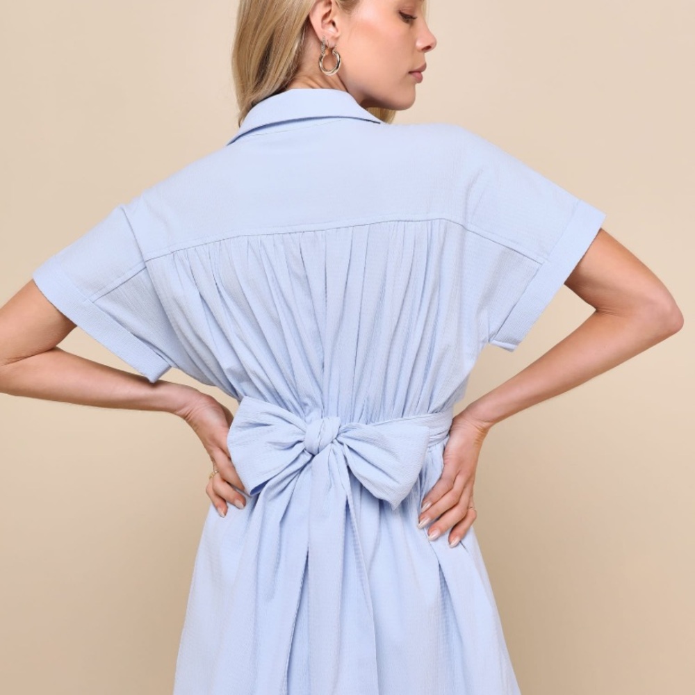 Lulus Breeze By light blue tie-back mini dress with pockets.